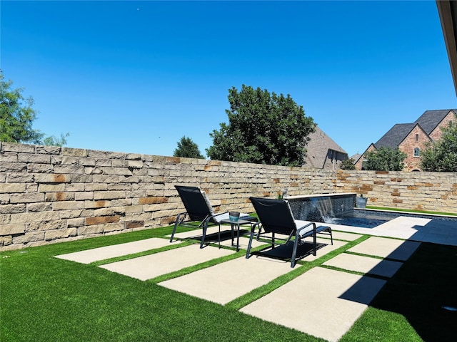 4600 Autumn Sage Dr, Prosper, TX 75078 - fenced backyard with a patio