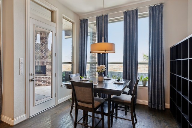 4600 Autumn Sage Dr, Prosper, TX 75078 - dining area featuring dark wood-style floors and baseboards