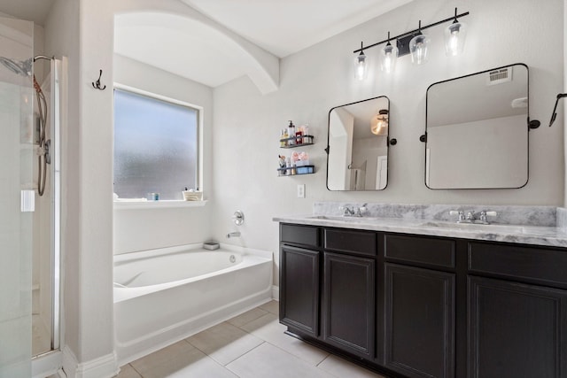3968 Hunter Peak Rd, Fort Worth, TX 76262 - full bathroom featuring a garden tub, double vanity, tile patterned flooring, and a shower stall