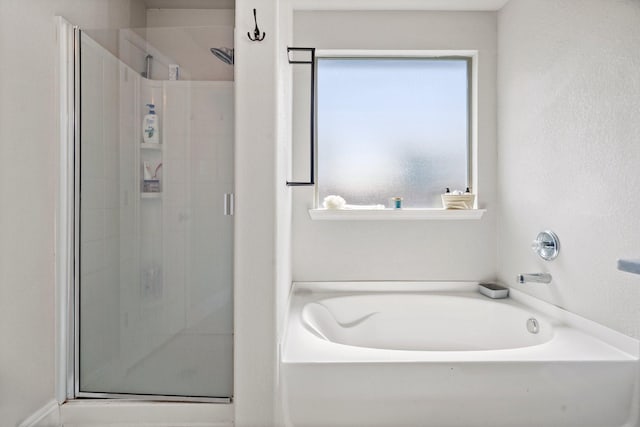 3968 Hunter Peak Rd, Fort Worth, TX 76262 - bathroom with a stall shower and a garden tub