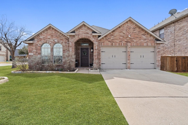 3968 Hunter Peak Rd, Fort Worth, TX 76262 - view of front of property featuring brick siding, a garage, driveway, and roof with shingles