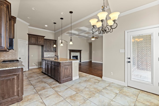 612 Buelwood Ct, Desoto, TX 75115 - kitchen featuring ceiling fan, coffered ceiling, tasteful backsplash, crown molding, and dark brown cabinets
