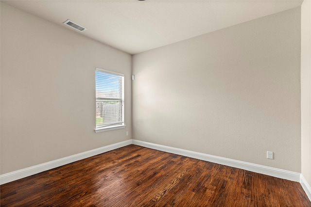 612 Buelwood Ct, Desoto, TX 75115 - spare room with dark wood finished floors and baseboards
