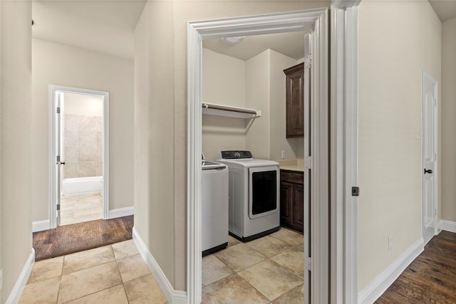 612 Buelwood Ct, Desoto, TX 75115 - laundry area with washer and clothes dryer and cabinet space