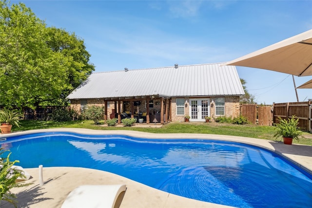 view of pool featuring a fenced in pool, a patio area, french doors, and fence