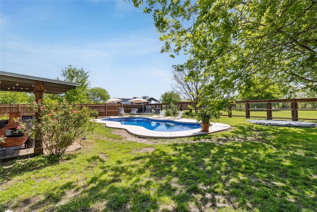 view of swimming pool with a yard, a fenced backyard, a fenced in pool, and a patio area