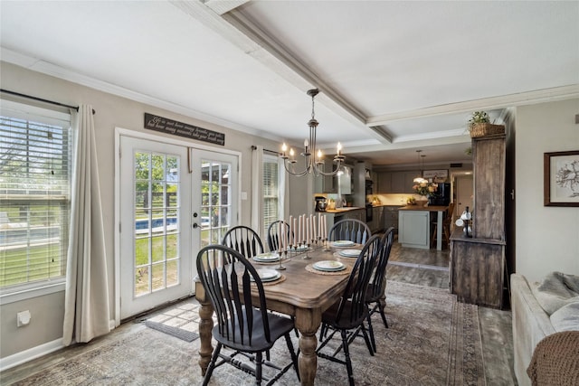 dining space featuring crown molding, french doors, an inviting chandelier, and beamed ceiling