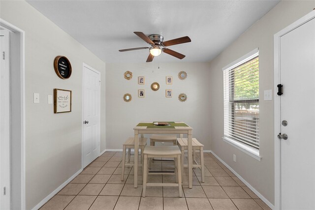 1905 W Morton St Unit 5, Denison, TX 75020 - kitchen featuring a sink, freestanding refrigerator, light tile patterned floors, white cabinetry, and a ceiling fan