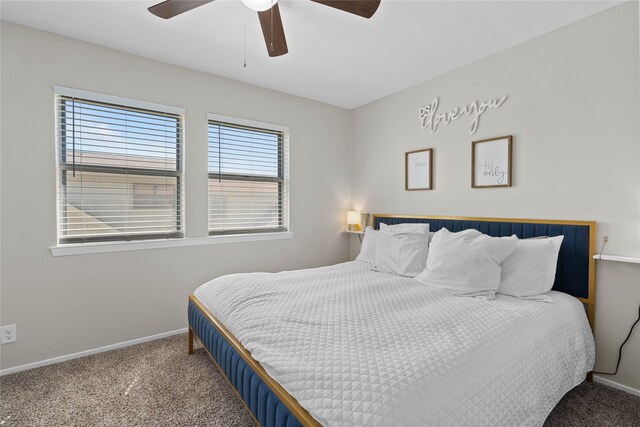 1905 W Morton St Unit 5, Denison, TX 75020 - carpeted bedroom with baseboards and a ceiling fan