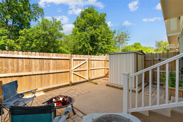 1905 W Morton St Unit 5, Denison, TX 75020 - carpeted bedroom featuring baseboards and a ceiling fan