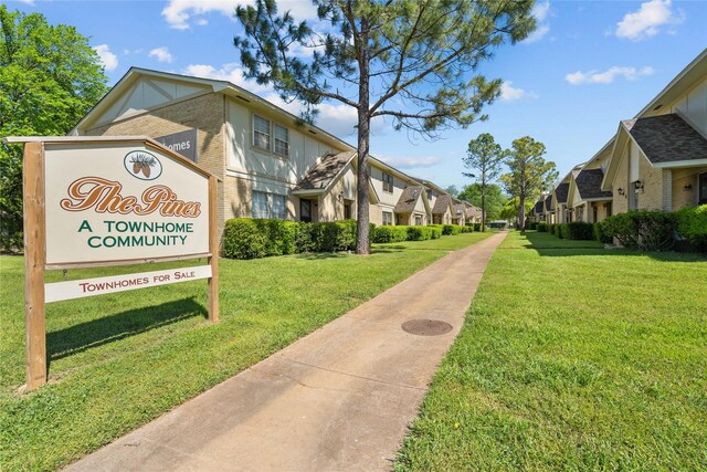 1905 W Morton St Unit 5, Denison, TX 75020 - view of community with a residential view and a lawn