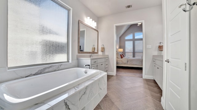 2500 Rosecroft Ct, Celina, TX 75009 - full bath featuring vanity, plenty of natural light, a bath, and connected bathroom