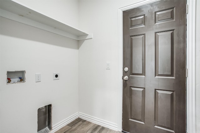 laundry room with washer hookup, baseboards, electric dryer hookup, laundry area, and wood finished floors