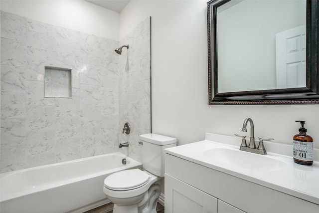 full bath featuring toilet, vanity, and bathing tub / shower combination
