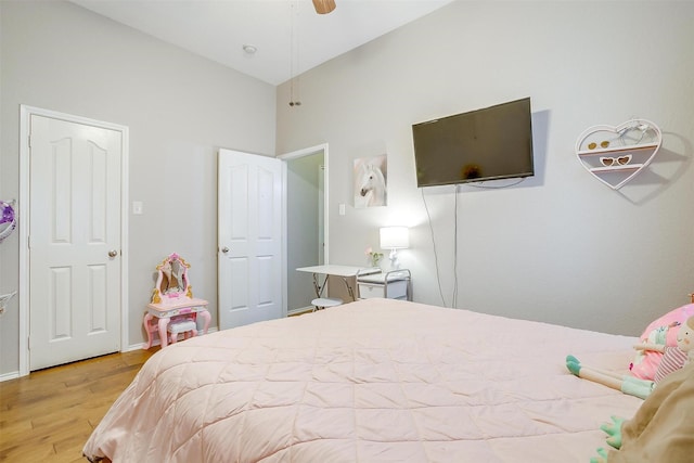 bedroom with wood finished floors