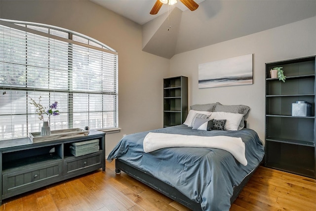 bedroom with ceiling fan and wood finished floors