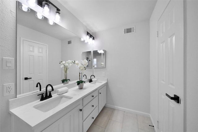7724 Standish Cir, Plano, TX 75025 - full bathroom featuring double vanity and tile patterned floors