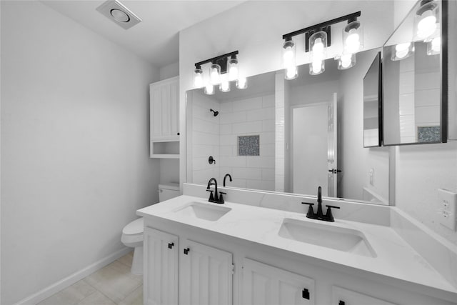7724 Standish Cir, Plano, TX 75025 - full bathroom with double vanity, a tile shower, and tile patterned floors