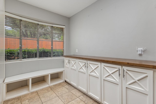 2306 Ravenwood Dr, Grand Prairie, TX 75050 - interior space featuring light tile patterned floors