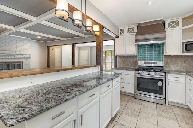 2306 Ravenwood Dr, Grand Prairie, TX 75050 - kitchen featuring appliances with stainless steel finishes, custom exhaust hood, tasteful backsplash, white cabinets, and glass insert cabinets