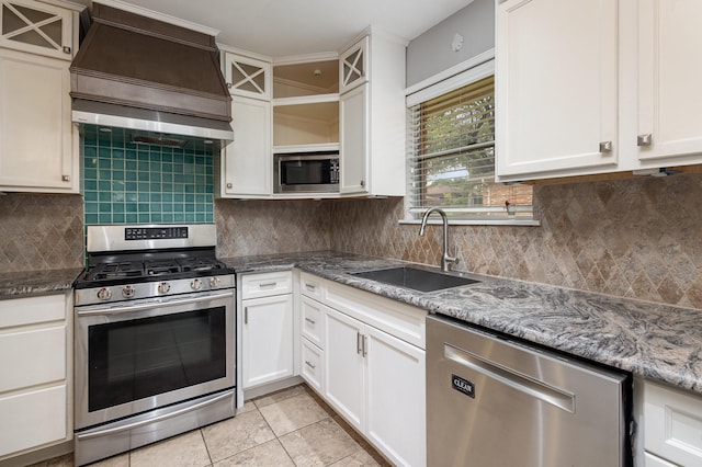 2306 Ravenwood Dr, Grand Prairie, TX 75050 - kitchen featuring stainless steel appliances, a sink, open shelves, stone countertops, and tasteful backsplash