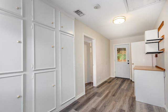 2306 Ravenwood Dr, Grand Prairie, TX 75050 - mudroom featuring wood finished floors and baseboards