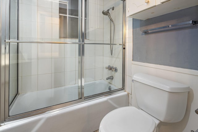 2306 Ravenwood Dr, Grand Prairie, TX 75050 - full bath featuring toilet and bath / shower combo with glass door