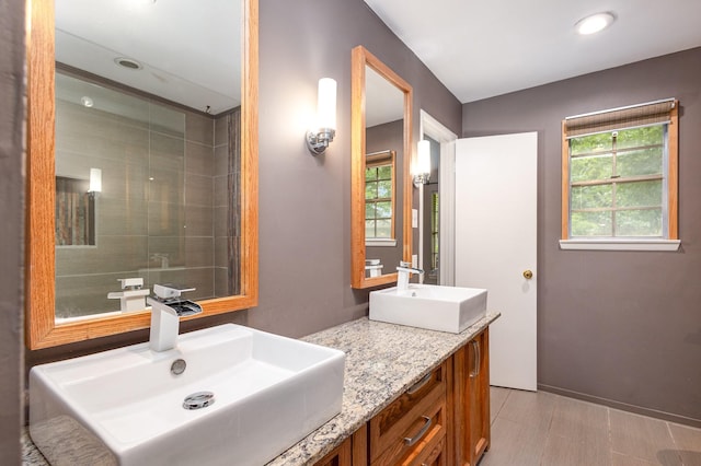 2306 Ravenwood Dr, Grand Prairie, TX 75050 - bathroom featuring recessed lighting and double vanity