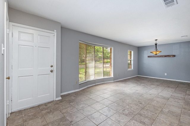 2306 Ravenwood Dr, Grand Prairie, TX 75050 - foyer entrance with baseboards