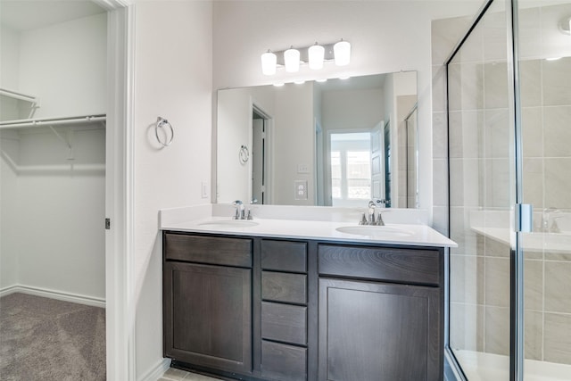 3800 Parsons St, Crandall, TX 75114 - full bathroom with double vanity, a sink, a walk in closet, and a shower stall