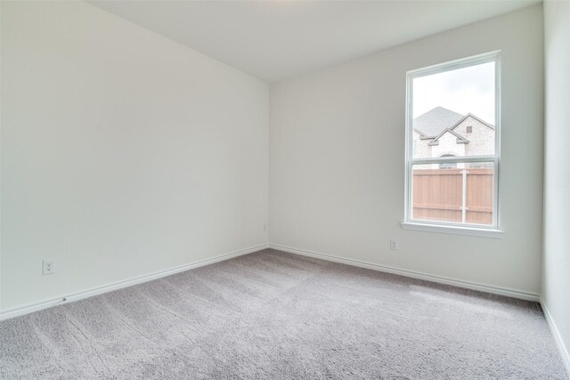 3800 Parsons St, Crandall, TX 75114 - spare room with baseboards and carpet floors