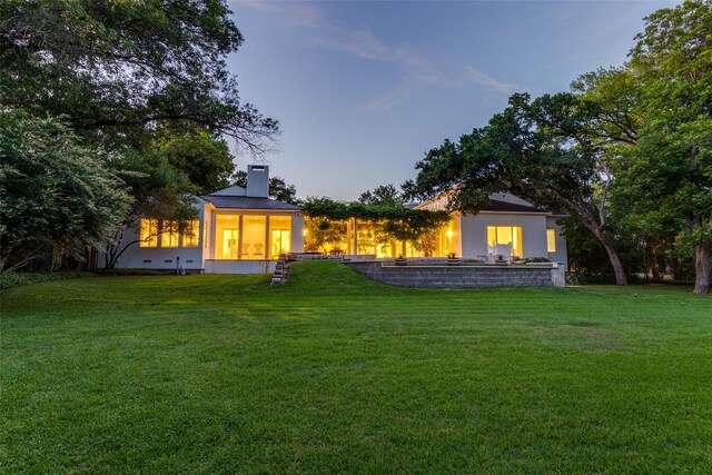 4524 Park Ln, Dallas, TX 75220 - back of property with a lawn and a chimney