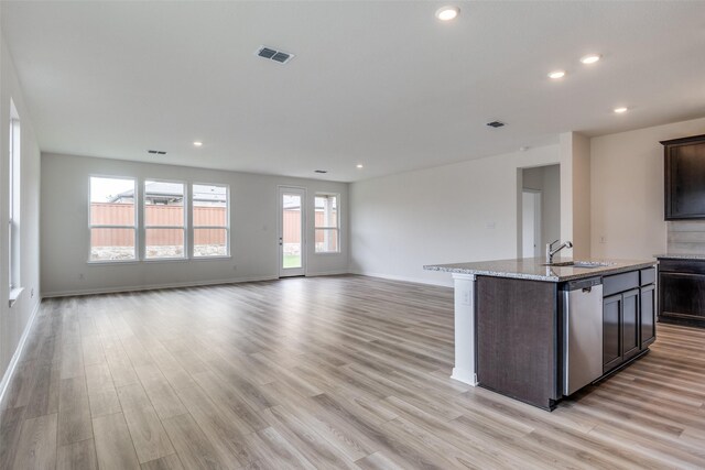 3836 Parsons St, Crandall, TX 75114 - kitchen featuring a sink, stainless steel dishwasher, open floor plan, and visible vents