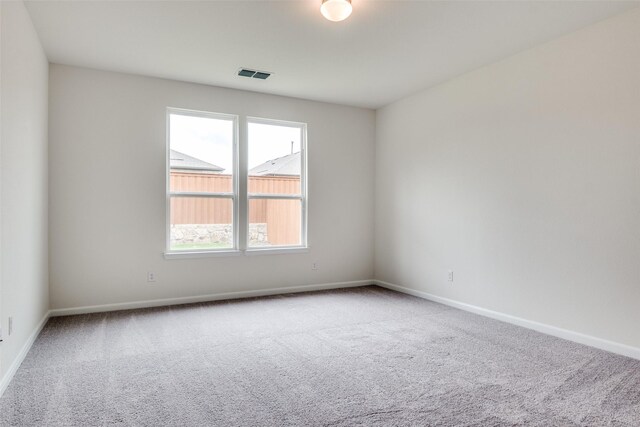 3836 Parsons St, Crandall, TX 75114 - carpeted empty room featuring visible vents and baseboards