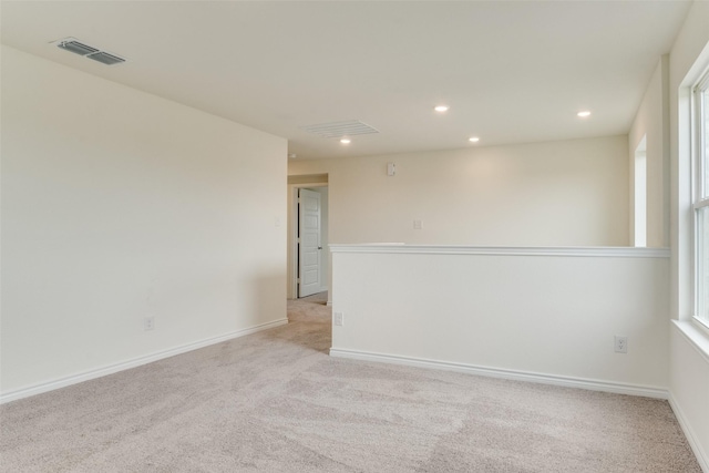 3808 Parsons St, Crandall, TX 75114 - unfurnished room with light carpet, recessed lighting, and visible vents