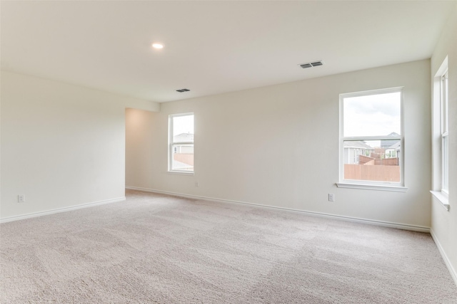 3808 Parsons St, Crandall, TX 75114 - spare room featuring baseboards, visible vents, and light colored carpet