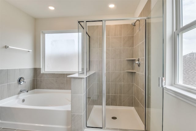 3808 Parsons St, Crandall, TX 75114 - bathroom featuring recessed lighting, a bath, and a shower stall