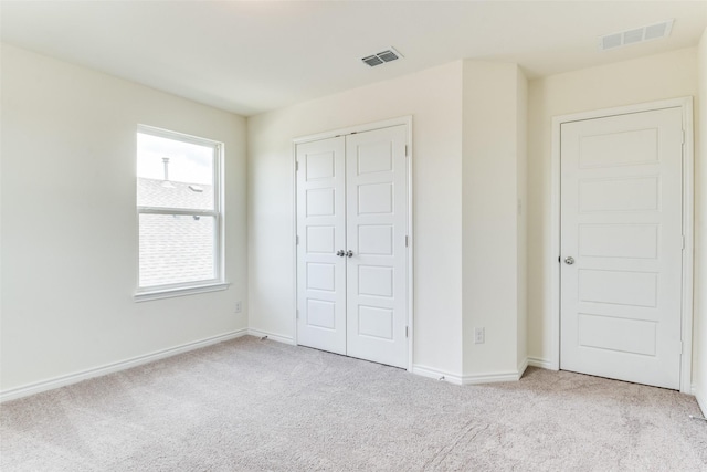 3808 Parsons St, Crandall, TX 75114 - unfurnished bedroom with a closet, baseboards, carpet flooring, and visible vents