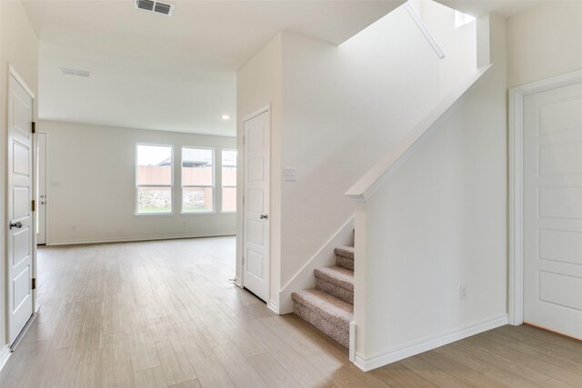 3808 Parsons St, Crandall, TX 75114 - stairway with recessed lighting, baseboards, visible vents, and wood finished floors