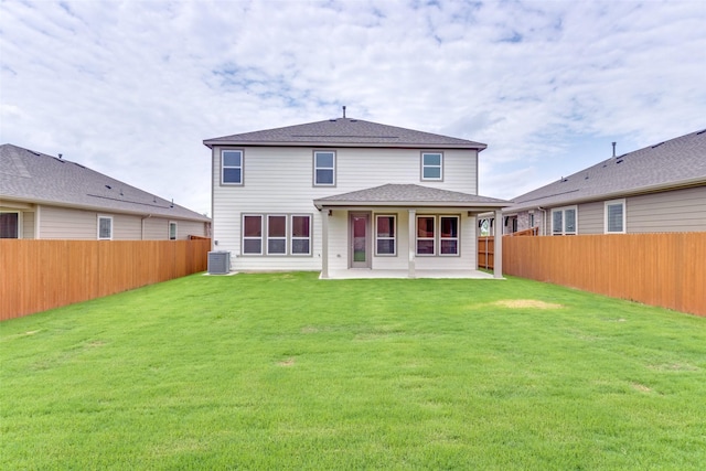 3808 Parsons St, Crandall, TX 75114 - rear view of house featuring a patio, a fenced backyard, central AC, and a yard