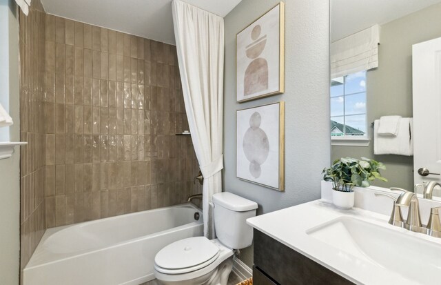 5921 Mayer Ave, Pilot Point, TX 75009 - full bath featuring bathing tub / shower combination, toilet, and vanity