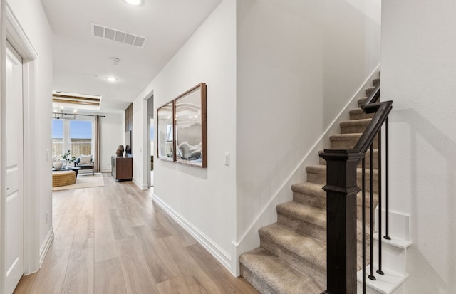 5921 Mayer Ave, Pilot Point, TX 75009 - corridor with stairs, wood finished floors, baseboards, visible vents, and recessed lighting