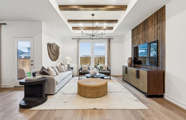 5921 Mayer Ave, Pilot Point, TX 75009 - living area featuring baseboards, beamed ceiling, a notable chandelier, and light wood-type flooring