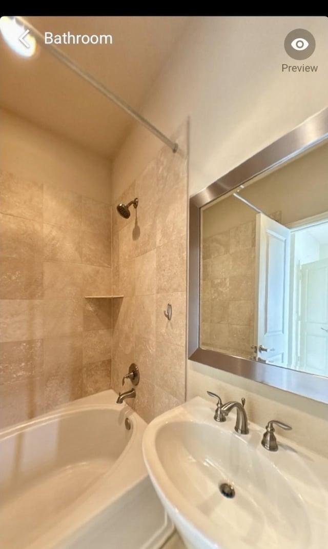 736 Skyline Bluff Ct, Fort Worth, TX 76102 - bathroom with a sink and tub / shower combination