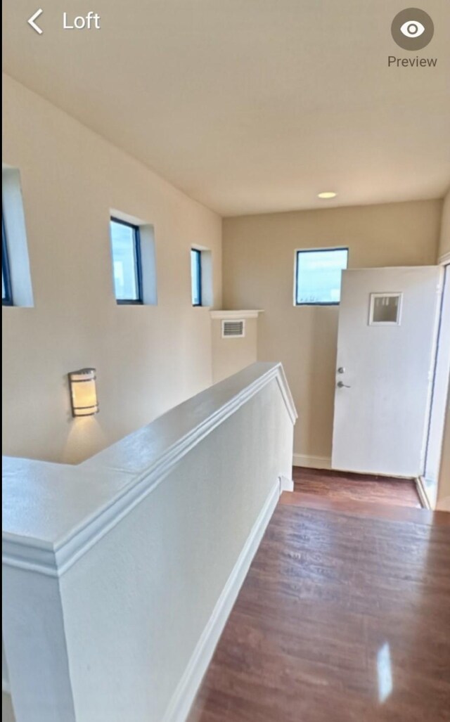 736 Skyline Bluff Ct, Fort Worth, TX 76102 - corridor with wood finished floors and baseboards