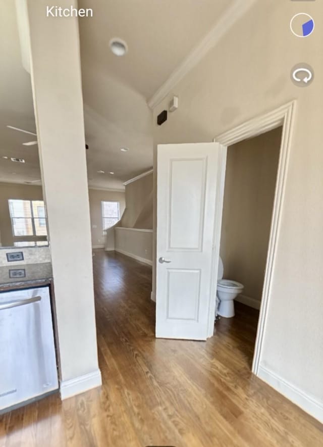 736 Skyline Bluff Ct, Fort Worth, TX 76102 - bathroom featuring ornamental molding, baseboards, toilet, and wood finished floors