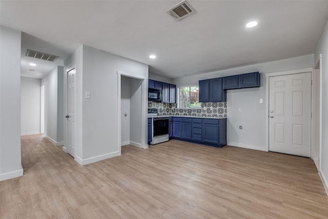 3945 Happy Canyon Dr, Dallas, TX 75241 - kitchen featuring black microwave, visible vents, electric stove, and backsplash