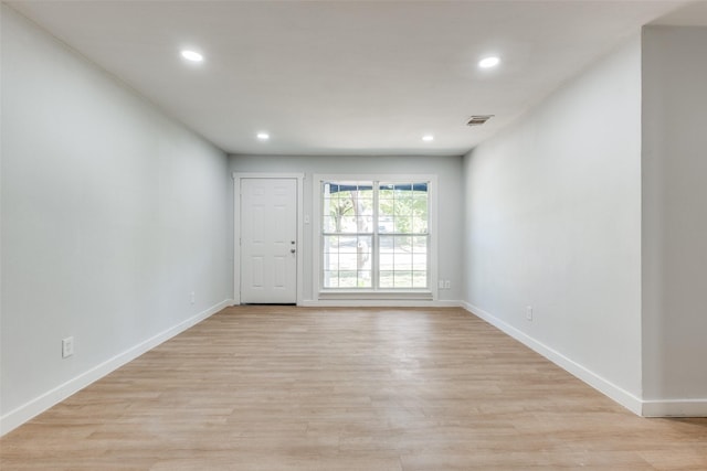 3945 Happy Canyon Dr, Dallas, TX 75241 - unfurnished room featuring baseboards, light wood-style flooring, visible vents, and recessed lighting