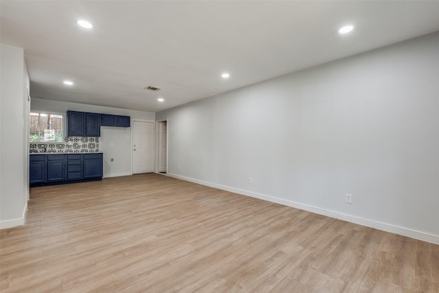 3945 Happy Canyon Dr, Dallas, TX 75241 - unfurnished living room with baseboards, visible vents, recessed lighting, and light wood finished floors