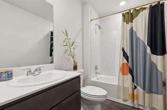 1002 Honey Maple St, Princeton, TX 75407 - bathroom with shower / tub combo, toilet, wood finished floors, and vanity